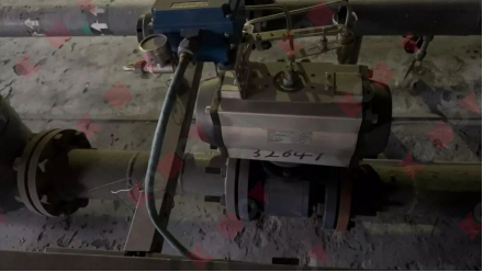 Valve and actuator documented in the original site photographs