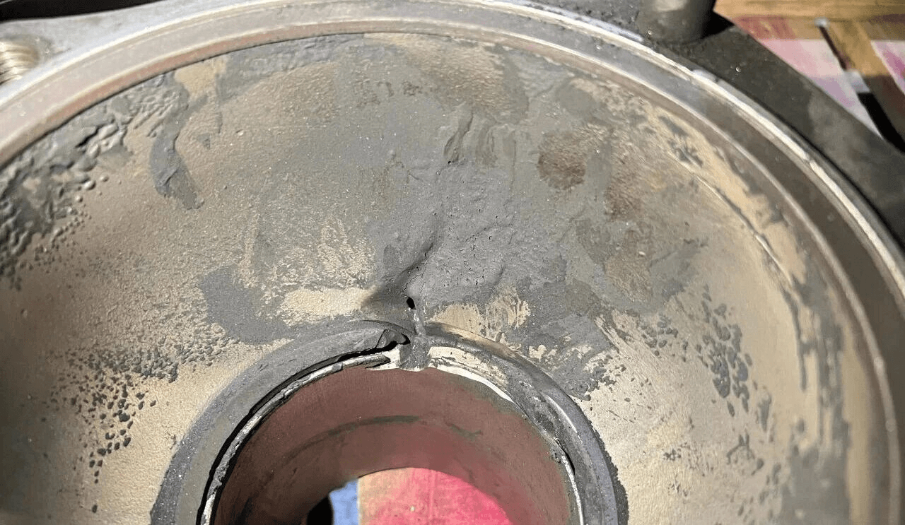 Worn internal surface pictured in the original fertilizer application report