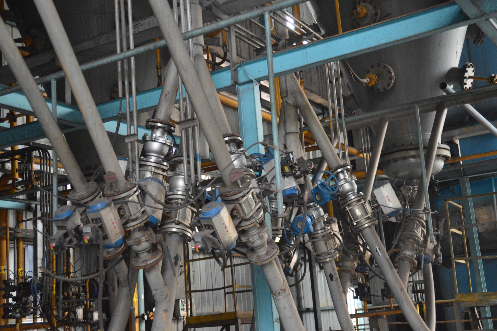 Ceramic valves installed in inclined pipework at a steelmaking plant